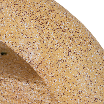 closeup of sand speckled cast cement texture on halo ring edge