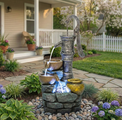 Resin Hand Pump Cascading Outdoor Fountain 32 Inch on patio