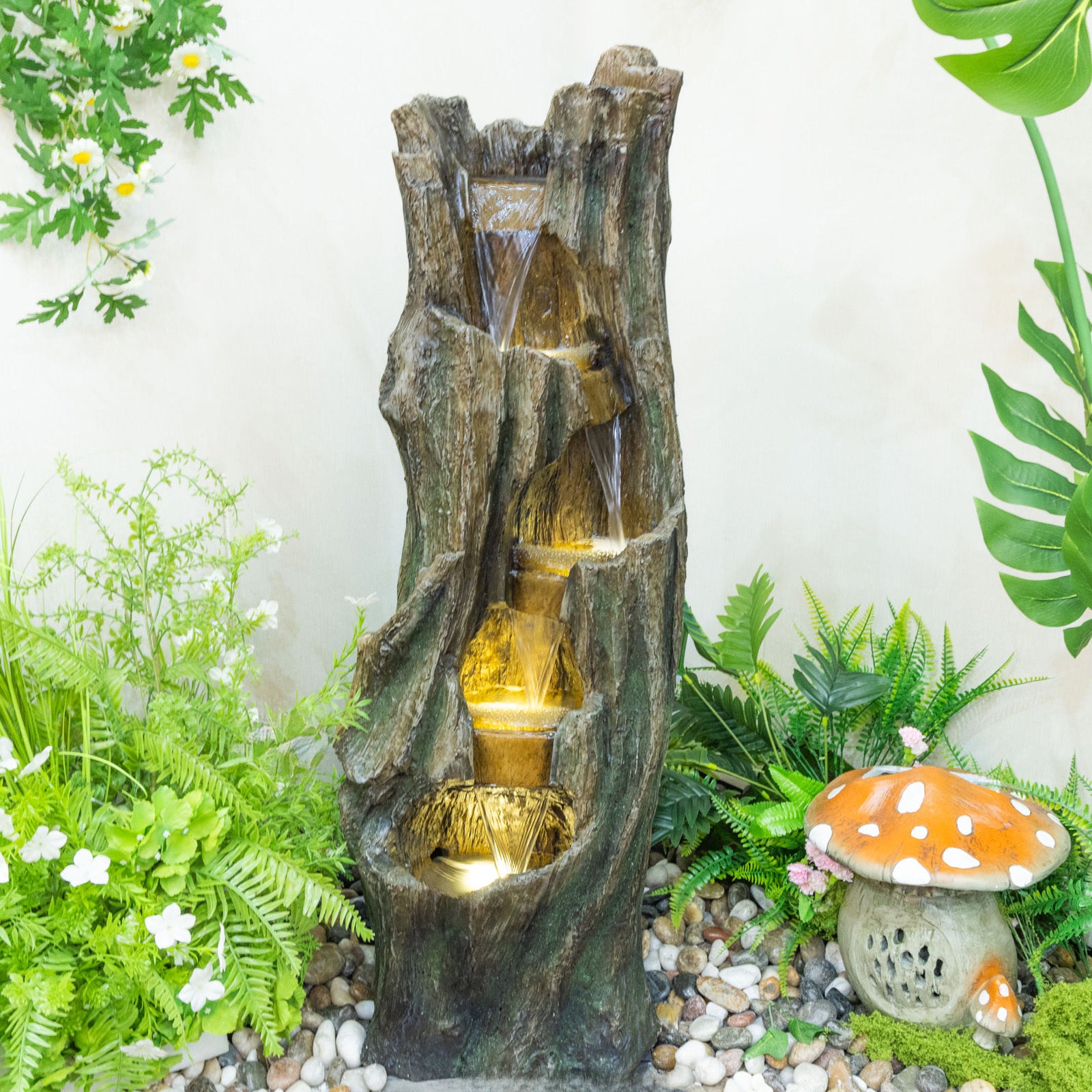 Resin Tree Trunk Outdoor Fountain 39 Inch in garden setting