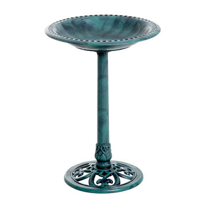 full view of fleur-de-lis green verdigris pedestal bird bath with shell basin