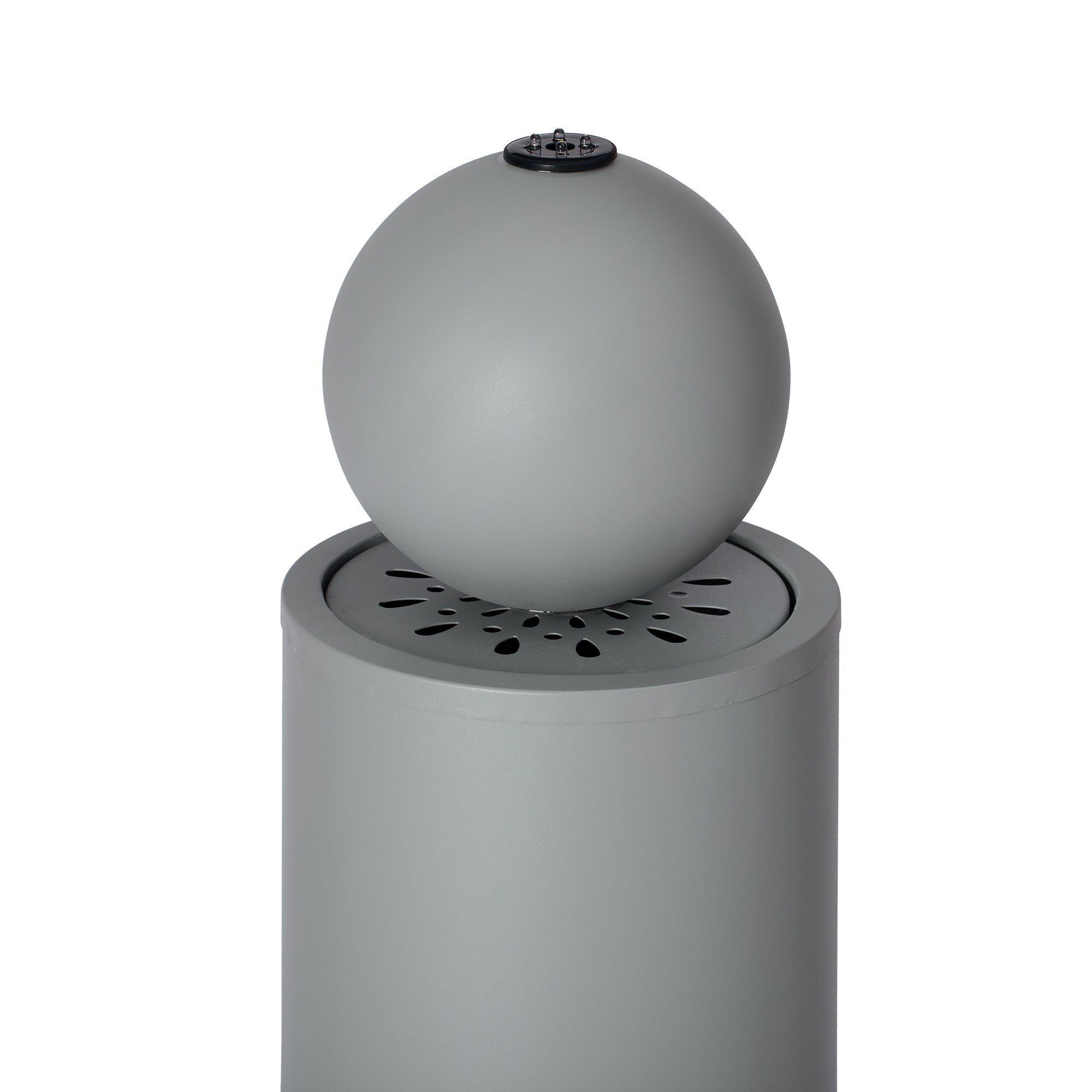 closeup of light gray sphere top bubbler on the fountain