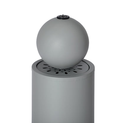 closeup of light gray sphere top bubbler on the fountain