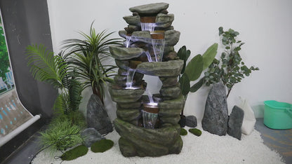 Video showcasing the soothing water flow and LEDs of the 60"H 7-tier rock fountain.