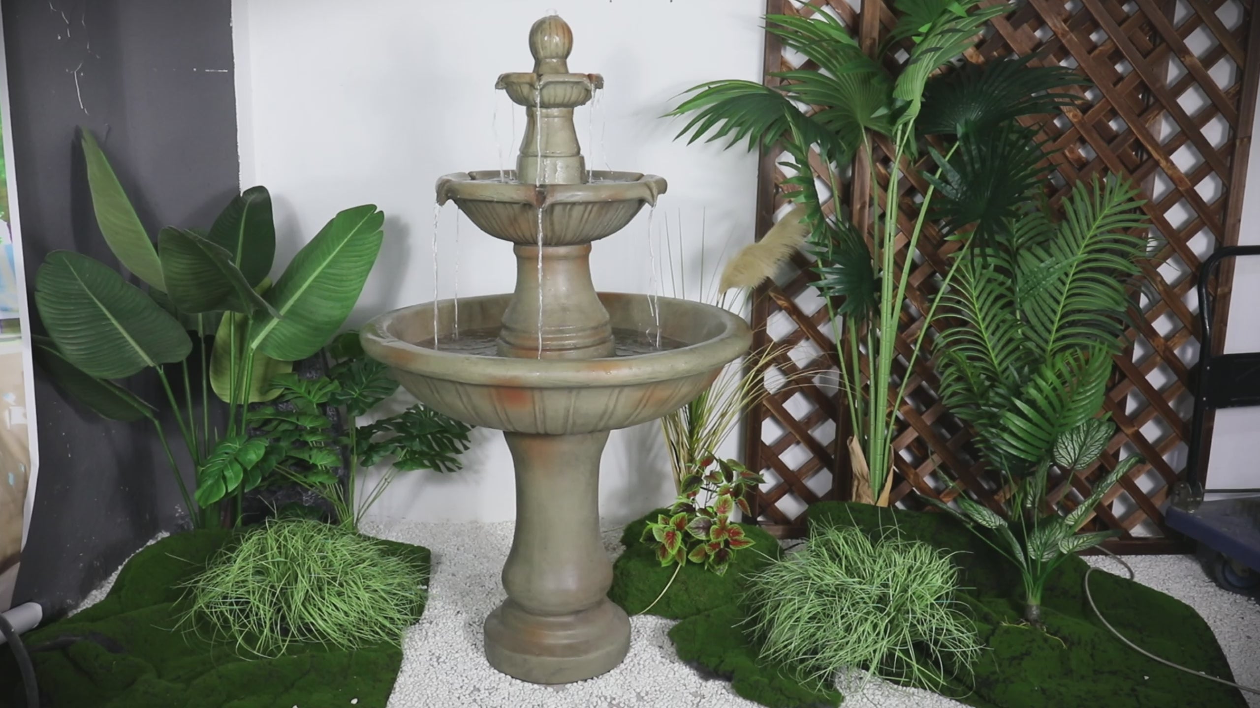 Video showing the soothing cascading water flow of the 51.5-inch 3-tier concrete fountain.
