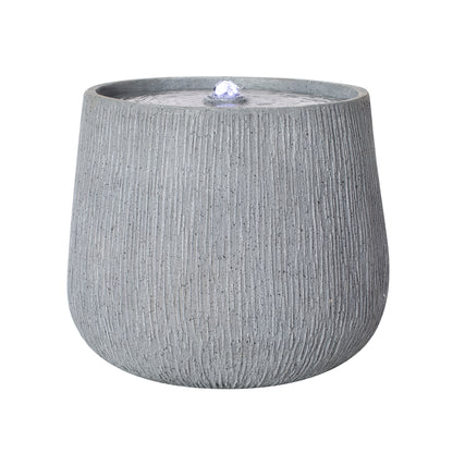 rippled basin bubbler fountain angled view with LED lit