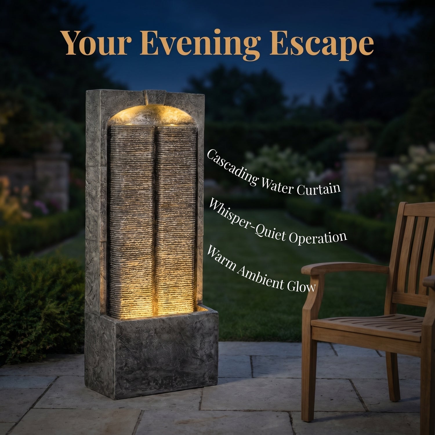 split slate column fountain in an evening garden setting