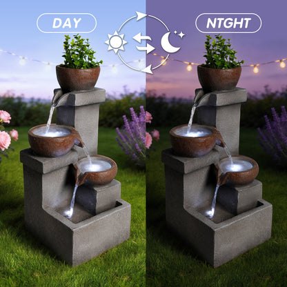stacked stone planter fountain day and night LED comparison