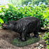 25.5"L realistic black bear garden statue standing proudly on a vibrant green lawn