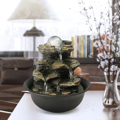 8.3" rock tabletop fountain with spinning crystal orb on a modern office desk