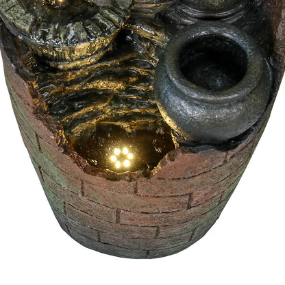 Close-up of the bottom basin showing realistic debris brick wall texture and integrated warm LED lights