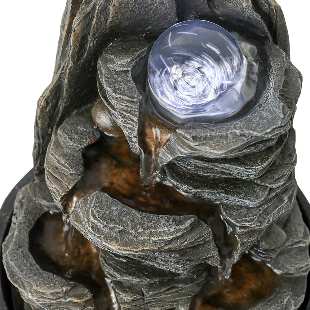 Resin Lit Spinning Orb Desk Water Fountain 9 Inch Slate in garden setting