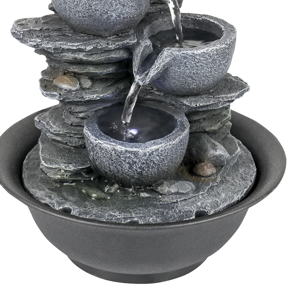 Close-up of the soothing water cascading through the secondary rockery bowls