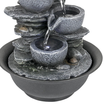 Close-up of the soothing water cascading through the secondary rockery bowls