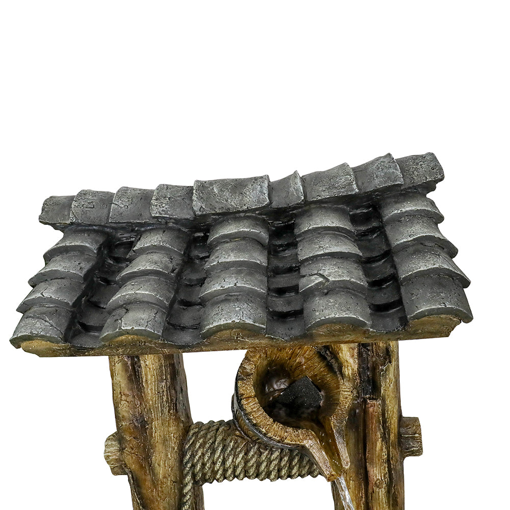 Detailed shot of the Asian-style rooftop on the vintage wishing well fountain