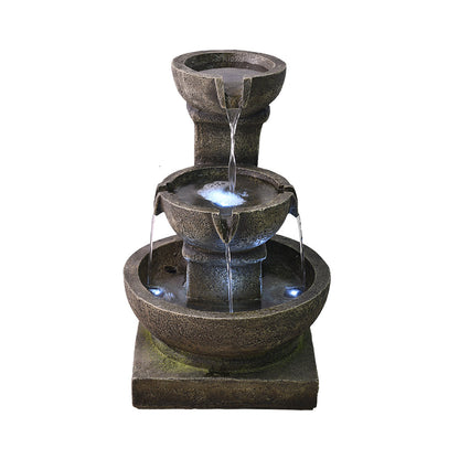 Front view of the 3-tier vintage moss garden fountain on a white background