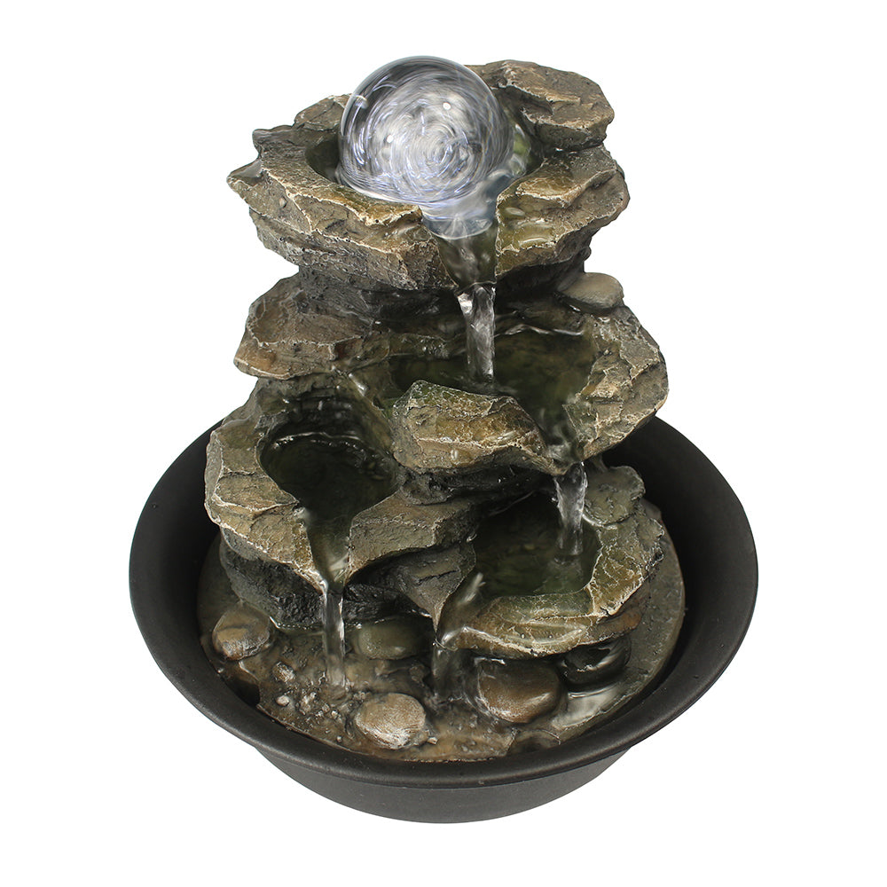 Front view of the 8.3" 4-tier rock tabletop fountain with LED crystal orb on white