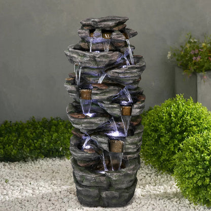 Grand 9-tier rock fountain serving as a stunning centerpiece for an outdoor patio