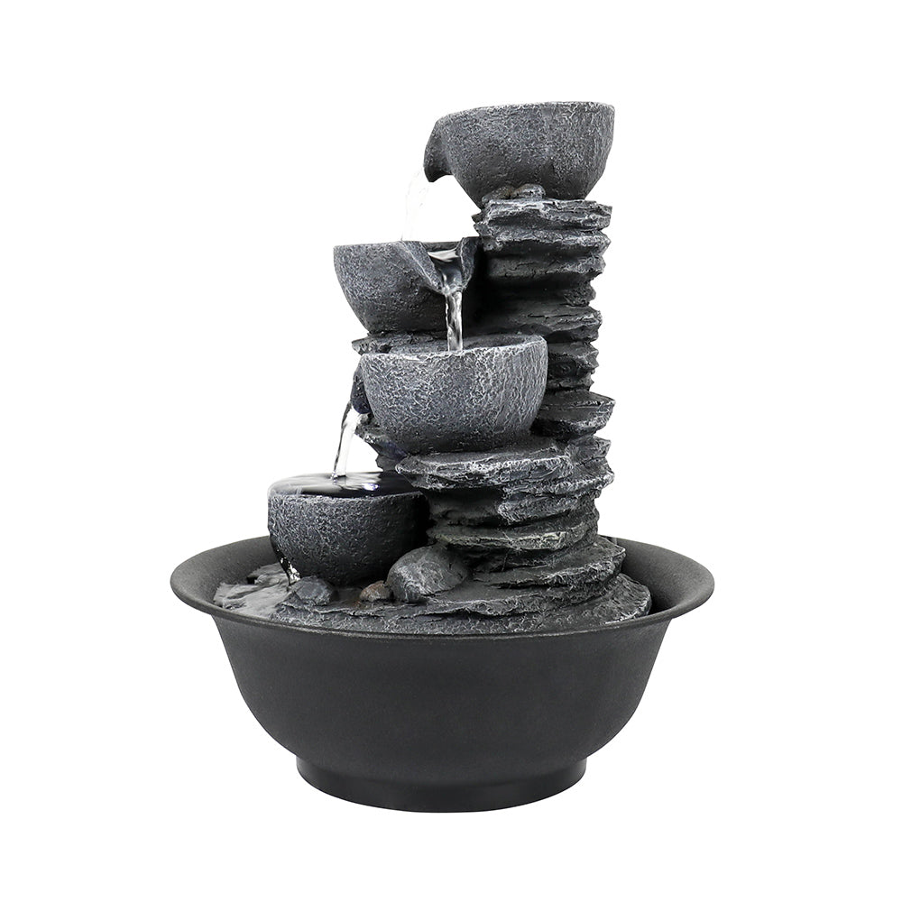 Left side profile of the realistic rock design indoor waterfall on white