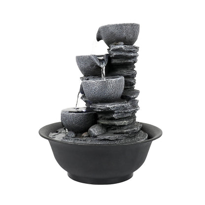 Left side profile of the realistic rock design indoor waterfall on white