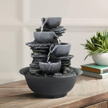 Light gray rockery tabletop waterfall decorating a cozy living room side table