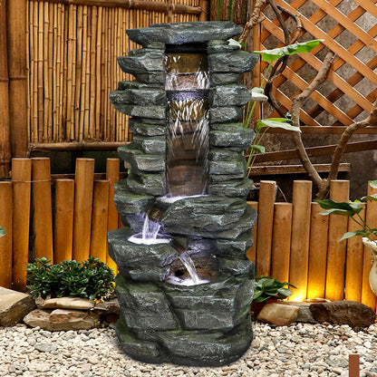 Stacked Shale Fountain Focal Point in Garden Landscape