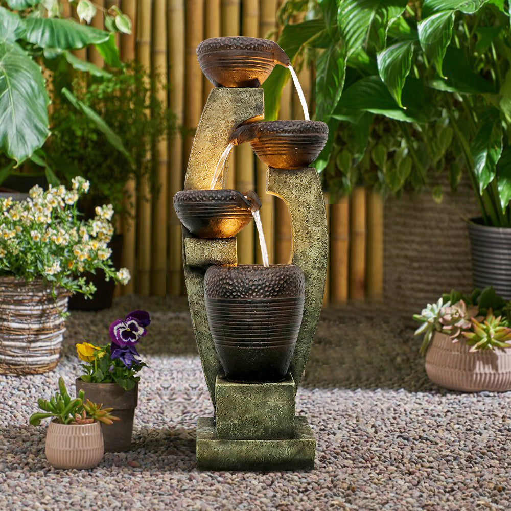 Resin Curved Sculptural Outdoor Water Fountain 40 Inch in garden setting